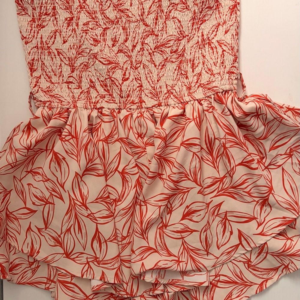Fashion Nova Coral and White Smocked Romper